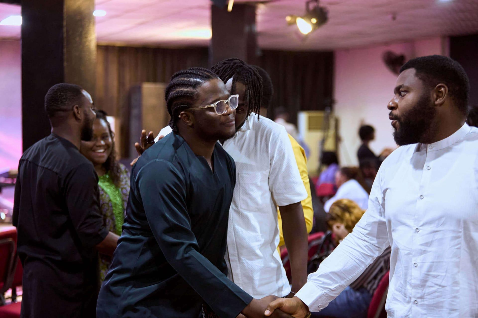 Brothers greeting one another — One City Men