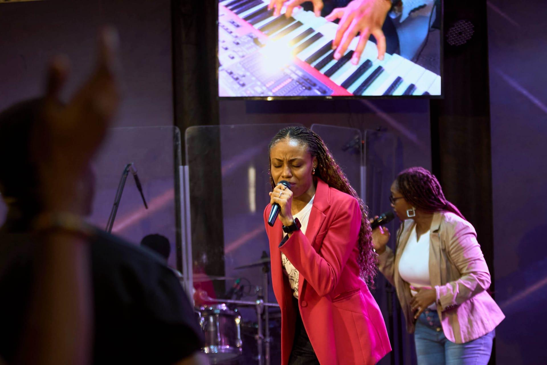 Women worshipping together — One City Women